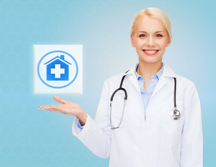 smiling doctor or nurse pointing to pills icon