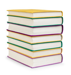 stack of colorful books in the textile cover on isolated white