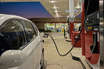 Refueling Automobile At Gas Station Convenience Store