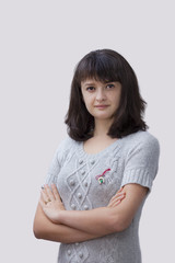 Fototapeta premium Young woman wearing Martisor - the romanian spring symbol