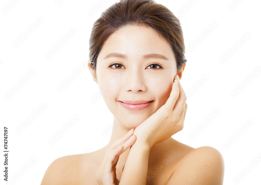 Wall mural beautiful young  asian woman face isolated on white