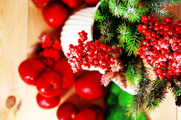 Christmas apples on wooden table