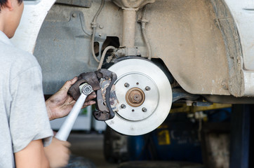 brake disc with technician hands