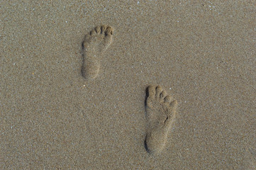 Human footprints in the sand
