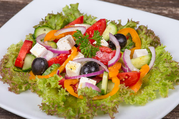 Fresh vegetable colorful greek salad in pate