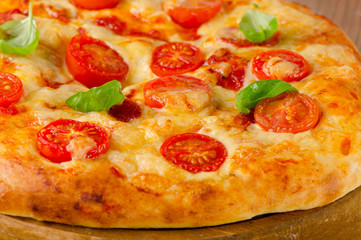 italian pizza with tomatoes, chees and basil