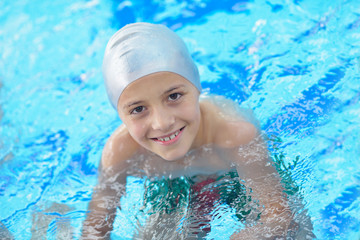 child portrait on swimming pool