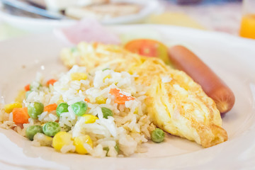Today breakfast is Fried rice with scrambled egg