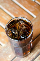 glass of cola with ice