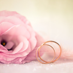 Love Wedding Background with Gold Rings and Beautiful Flower
