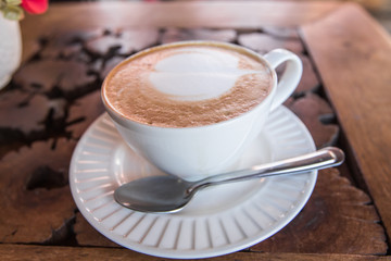 Latte coffee on wood table