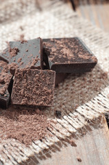 chocolat on wooden table and  burlap background