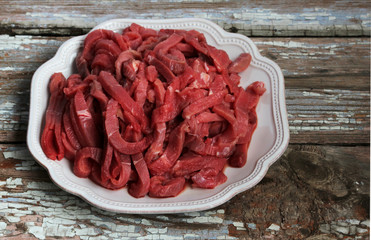 Fresh meat cut into thin strips