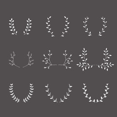 Hand-drawn silhouettes brackets branches graphic design elements