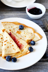 crepes with blueberry jam