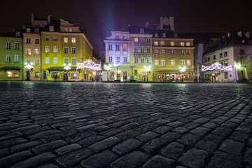 Christmas decorations on the old town of Warsaw at night