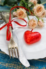 served table and cut roses for Valentine's day