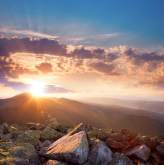 Fototapeta premium Beautiful sunset in the mountains landscape. Dramatic sky and co