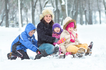 Happy family enjoying in winter