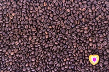 heart on the background of coffee beans