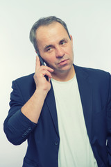 Portrait Of Young Man Talking On Cell Phone