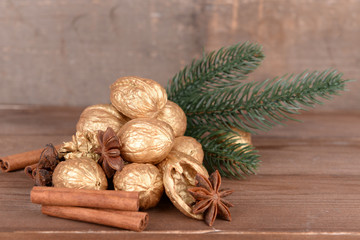 Beautiful Christmas composition with golden walnuts,