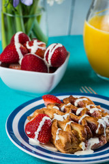  table set up for spring breakfast with fresh flowers in vibrant