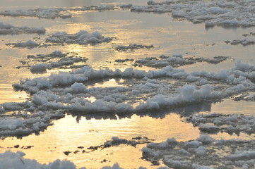 Floe flowing river. The middle of winter. The riverbed