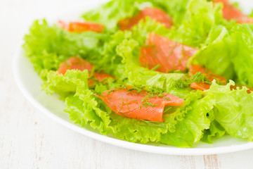 salad with salted salmon on plate