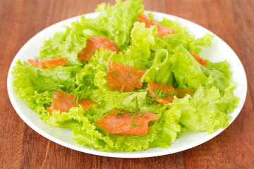 salad with salted salmon on plate