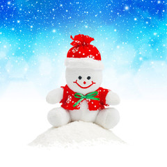 Smiling Generic Christmas Snowman Toy sitting on snow pile