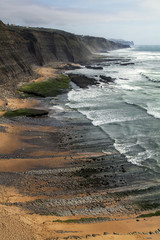 rocky beach of Magoito, located in Sintra, Portugal.