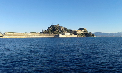 Fototapeta na wymiar corfu castle rock and blue sea