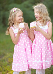 Portrait of two little girls twins