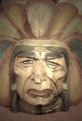 Fototapeta na wymiar native american indian chief wood carving.