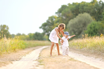 Small Brother and sister in summer nature
