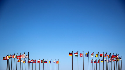 international flags against the sky
