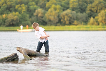 Fototapeta premium Portrait of a boy on vacation in summer camp