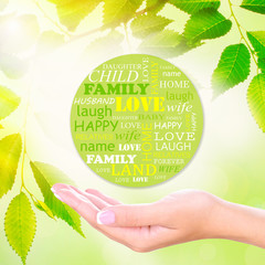 Family concept, family word cloud in hand