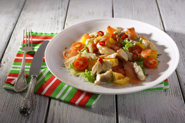 Fresh fish salad with vegetables