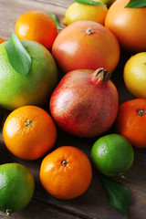 Ripe citrus with green leaves close-up background