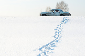 Fototapeta na wymiar car on a snowy road