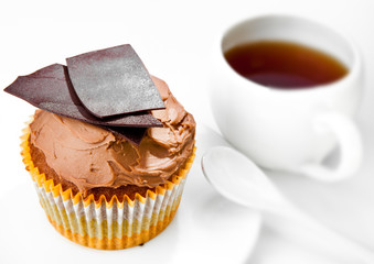 Chocolate fruitcake and cup of tea