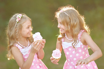 Fototapeta premium Portrait of two little girls twins