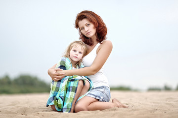 portrait of a happy family on summer nature