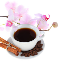 Coffee cup and pink orchid