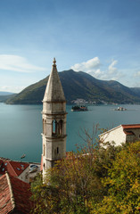 Church tower and islands in Perast, Boka Kotorska Bay, Montenegr