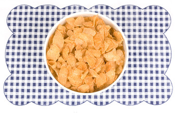 Healthy breakfast, plate with sweet cornflakes.