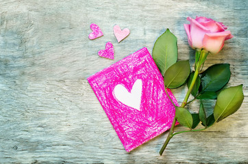 Valentine's background with a flower and card