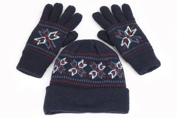 cap and gloves perfect for winter time isolated on white